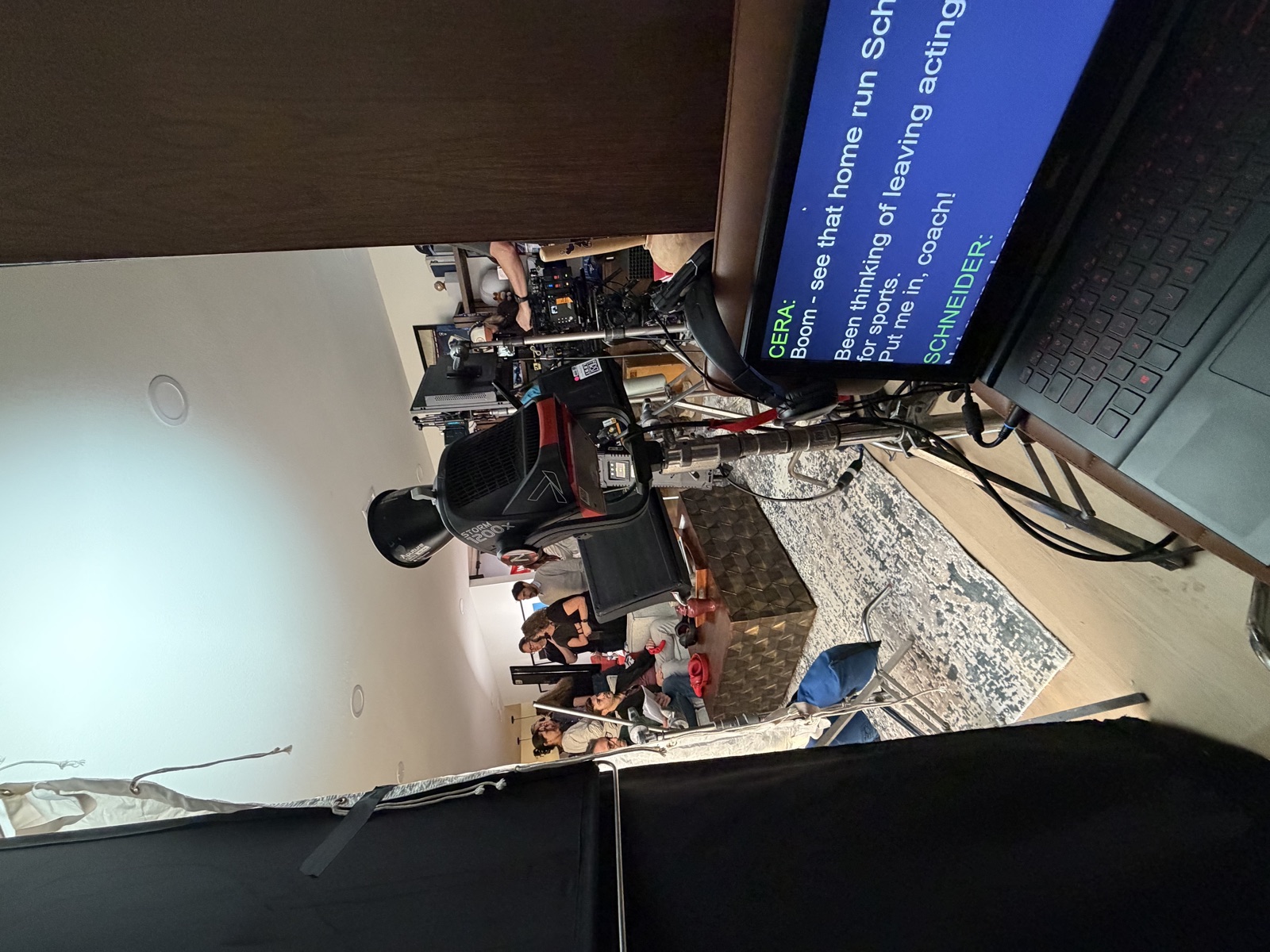 Scripted scene on location with teleprompter monitor