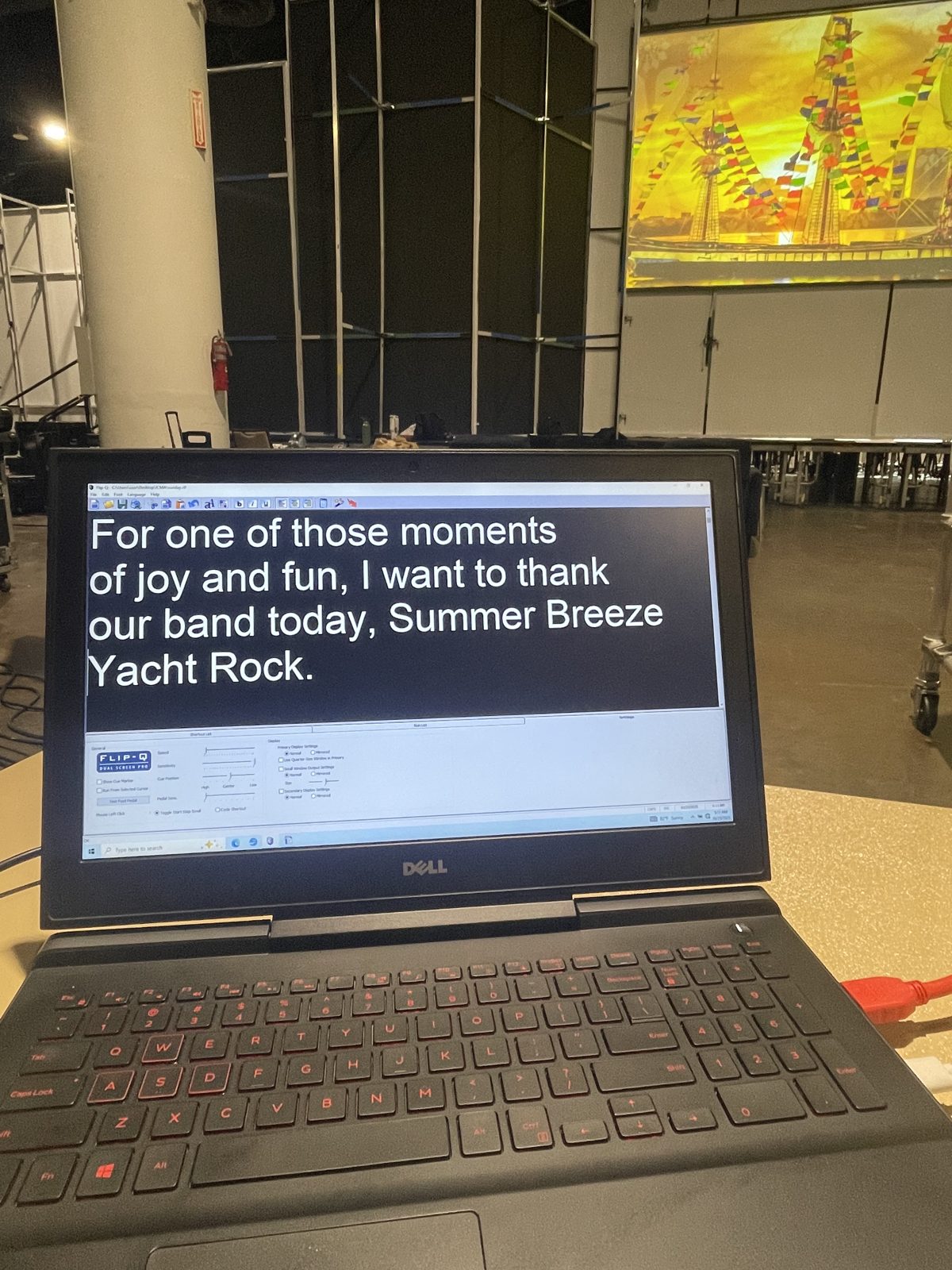 Operator laptop running a script at a live event